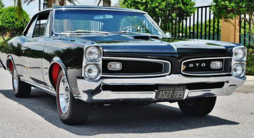 1 of anf kind 1966 pontiac gto tripower 4-speed multiple show winner gold