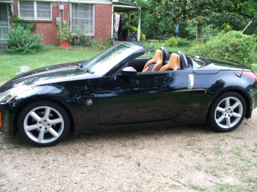 2004 black 6-speed manual 3.5l v6, miles:41,470 leather seats, bose stereo!