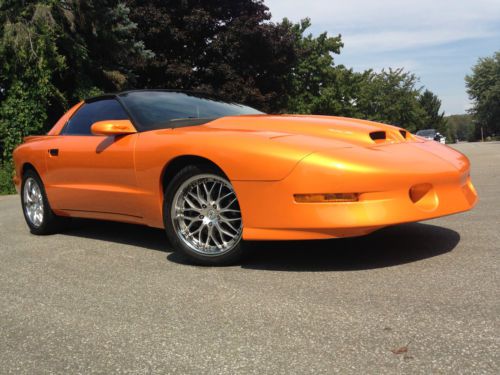 Orange 1996 pontiac firebird 6-speed 383 supercharged t-tops- $20k upgrades