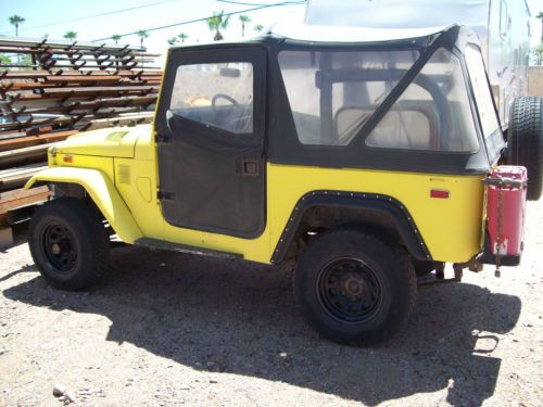 Fj40 with disk breaks on front axil, bilt in tool boxes under rear junp seats