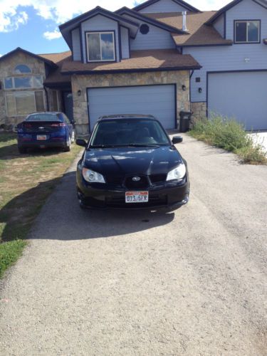 2007 subaru impreza sedan four dour 2.5i manual transmission sunroof spoiler