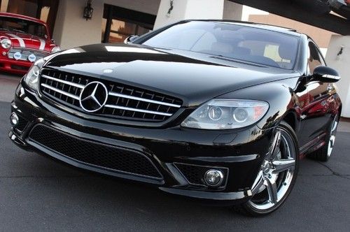 2009 mercedes cl63 amg. designo pkg. blk/white. piano wood. loaded. warranty.