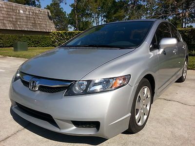 Silver-gray manual clean title low miles