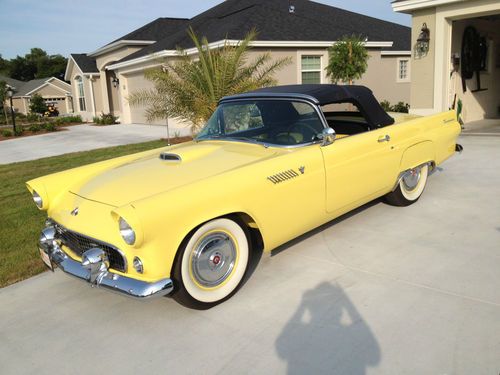 1955 thunderbird    rare goldenrod yellow paint with black soft top