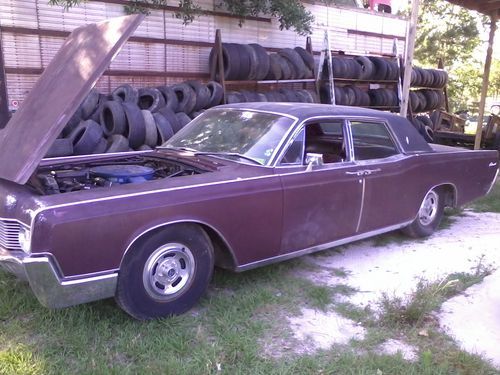 1967 lincoln continetail with suicide doors.