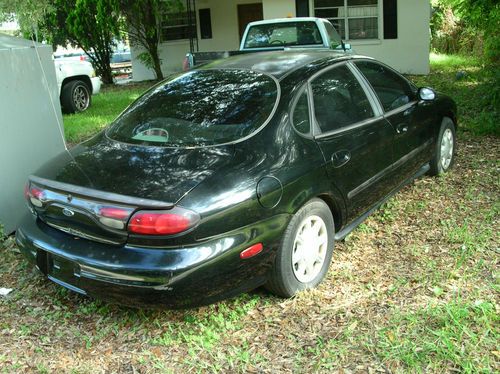 1998 ford taurus, mechanics spec. good engine, body, interior.  bad trans