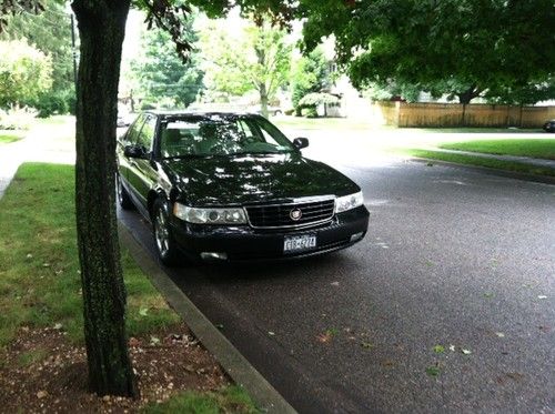 2004 black cadillac seville sls 4d sedan approx 62,000 miles, mint condition