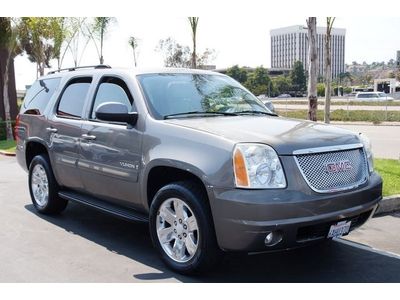 Suv leather third row seat onstar abs (4-wheel) air conditioning am/fm stereo