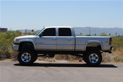 Lifted 2005 gmc sierra 2500 crew cab 6.0l... gmc sierra with 10" tfs lift kit