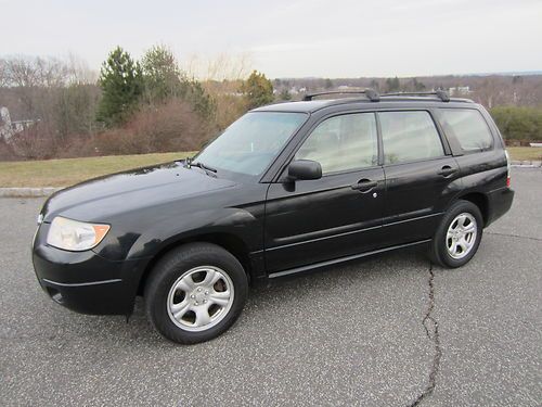 Black 2006 subaru forester 2.5l awd runs perfect 1 owner