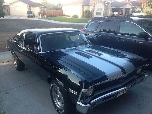 1971 chev nova ss, black on black, bucket seats, center concole...restored....v8