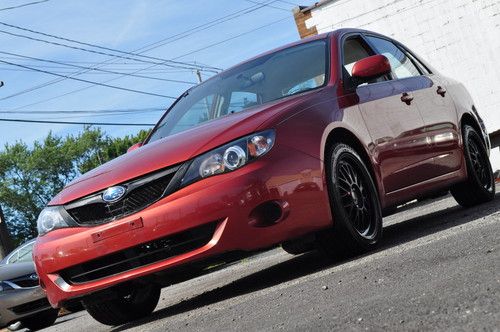 42k 5 speed awd cd a/c base sedan nice car priced right rebuilt title 08 10 11