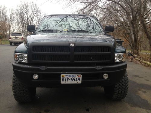 1998 jacked up dodge ram 1500 sport extended cab pickup 2-door 5.2l