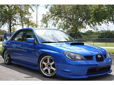 06 subaru impreza wrx awd 2.5l turbo, 5 speed manual, no accidents, no reserve.