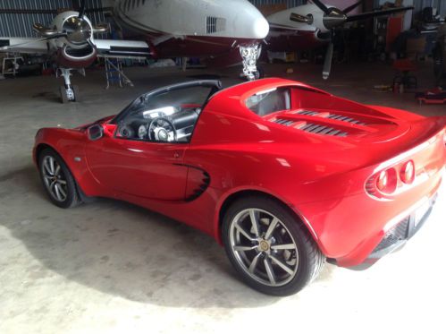 Racing red lotus convertible, low mileage