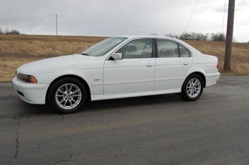 Sunroof loaded 58k miles new bmw trade clean white tan good tires look at this