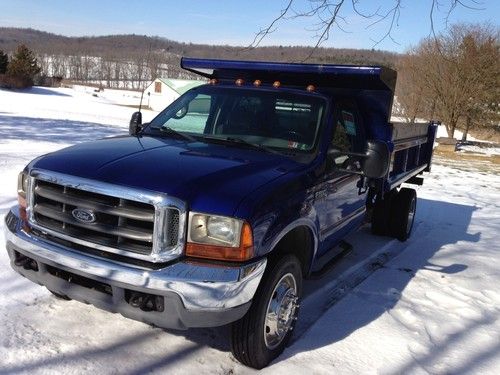 Ford f550 7.3  diesel 4x4,  11'  dump body (a must see)