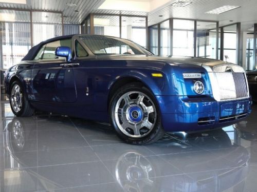 Msrp $523k  drophead convertible brushed steel &amp; teak hood bespoke headlining