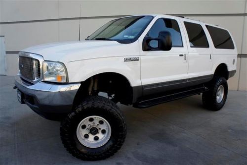 Custom lifted 01 ford excursion 4x4 v10 parktronic big 37 toyo tires third row s