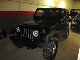 Wrangler 33 inch tires lifted 4 inch suspension 5 speed manual air conditioning