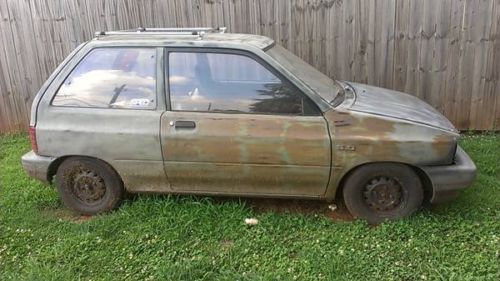 1991 ford festiva hatchback 2-door 1.8l  protege engine 5-speed,  4cyl. no title