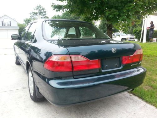 1998 honda accord lx 4 doors sedan 4 cylinders 2.3l with 213k miles.