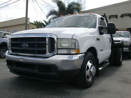 Turbo diesel 5 speed flatbed dually truck 2wd priced to sell!!!!!!!