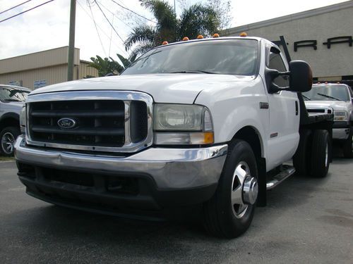 Turbo diesel 5 speed flatbed dually truck 2wd priced to sell!!!!!!!