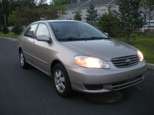 2004 toyota corolla le! 5 speed manual! wheels! clean! 128k miles!