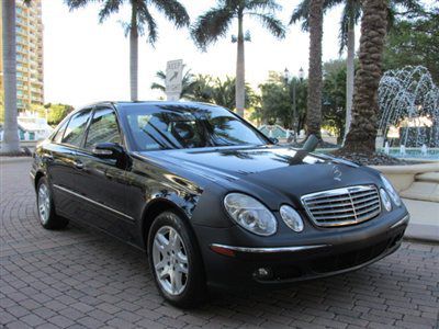 Black mercedes e 320 with charcoal leather clean autocheck