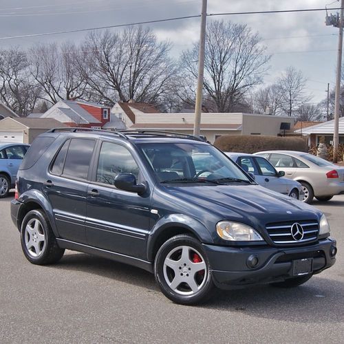 Make offer one owner ml 55 amg navigation rear dvd heated leather moonroof nice!