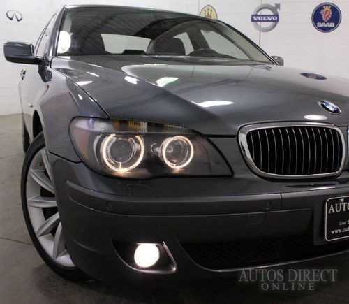 We finance 2006 bmw 750li 85k clean carfax mroof navi hids htcldsts 6cd wrrnty