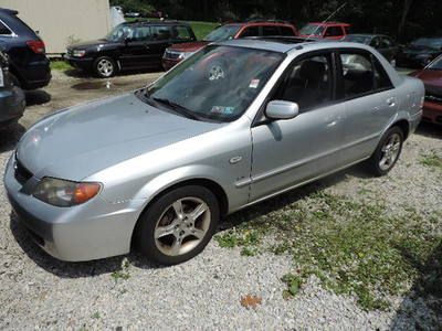 2003 mazda protege lx, no reserve, looks and runs fine, we have all service rcds