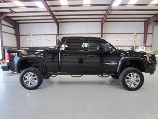 Black crew cab duramax diesel 6in lift 20s new tires financing nav roof tv clean