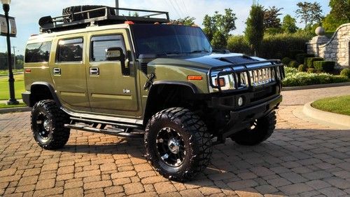 Lifted hummer h2 suv fairly new rims tires lift stereo system tvs $10k in extras