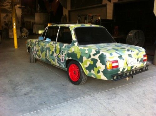 California car,camo color, sunroof,