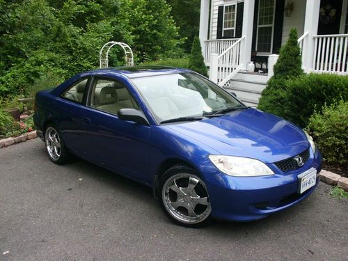 Blue 2004 honda civic ex coupe 2-door 1.7l with amp and subwoofer