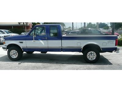 7.3 power stroke diesel 4x4 long bed super cab automatic blue clean cold a.c.