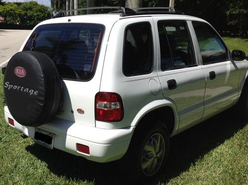 4-Door 2WD Automatic 2.0L 130 horsepower 4 cylinder DOHC engine, image 4