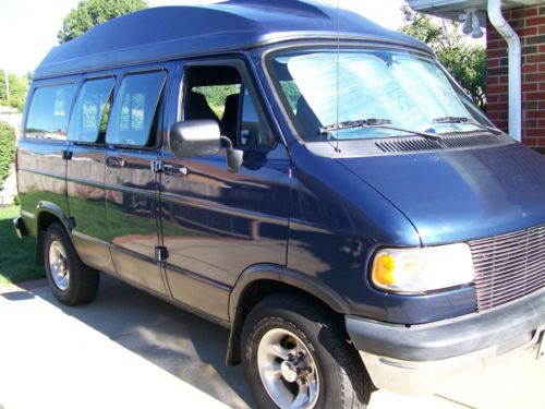 A rebuilt blue 94 dodge ram wheelchair accessible van for sale!!