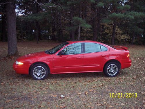 2002 oldsmobile alero gls sedan 4-door 3.4l,  ( 58324 miles )  bright red