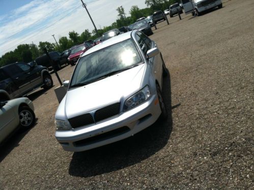 2002 mitsubishi lancer 60k only runs great looks sharp non smoker ! great on gas