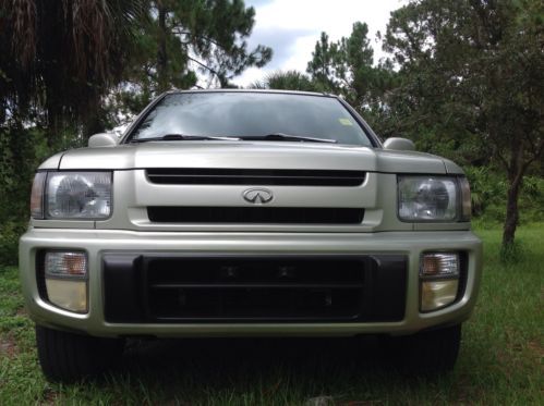 Absolutely mnt time capsule,florida cream puff,qx4,100k,no rust,loaded ,4wd/2wd