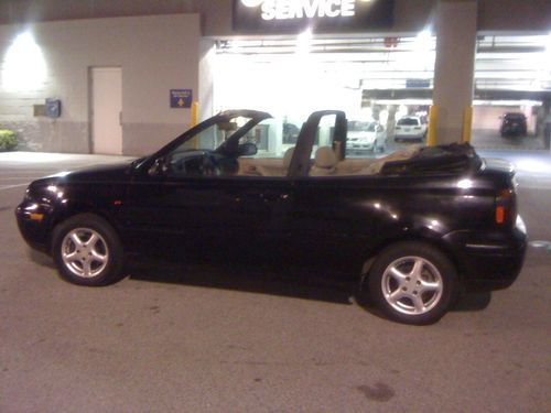 Black, in good condition, all electronic, clean interior.