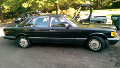 Sedan, charcoal exterior, black interior, great cosmetic condition