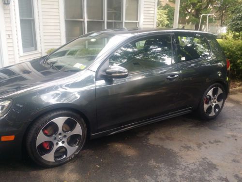 2011 volkswagen gti w/ 6 spd, nav, sunroof, xenon headlights and plaid interior