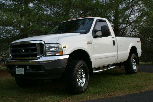 2003 ford f 250 xlt, fx4, superduty, v10 4x4 one owner, loaded with all options