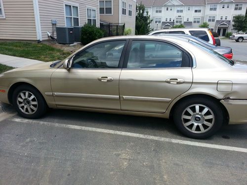 2002 gold kia optima