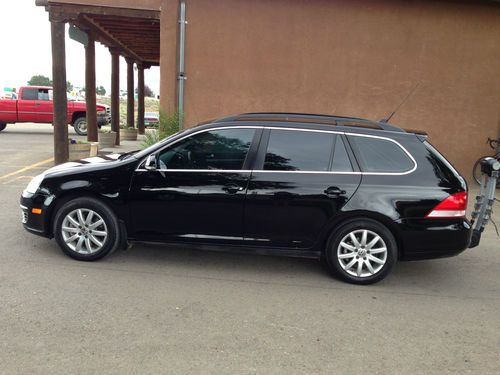 2009 black volkswagen jetta sportwagen tdi high mpg great condition! 75,000mi