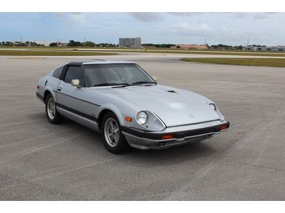 Datsun, 280 zx turbo,  t-tops, books, records, window sticker,  no reserve